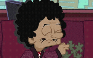a cartoon character with curly hair is sitting on a couch with his eyes closed