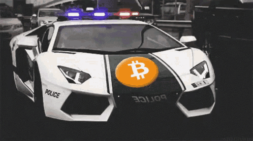 a police car with a bitcoin symbol on the front of it