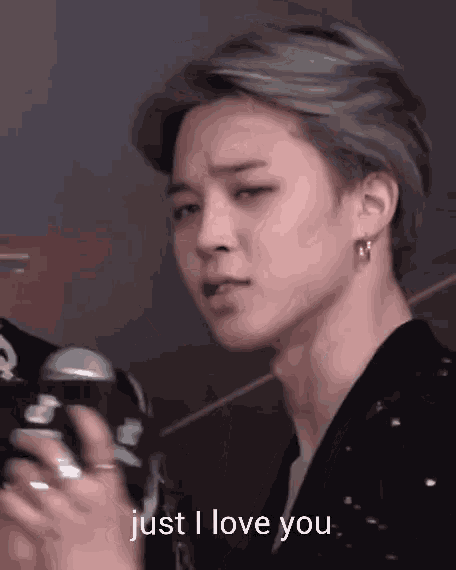 a close up of a person 's face with the words just i love you on it
