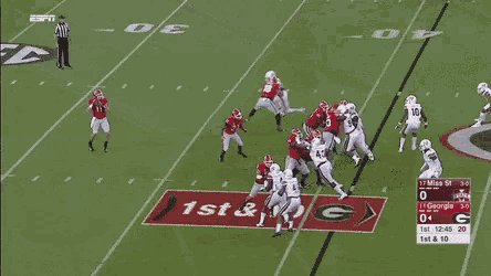 a football game between mississippi and georgia is being played on espn