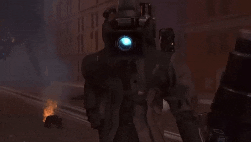 a robot with a camera on its head is standing on a street