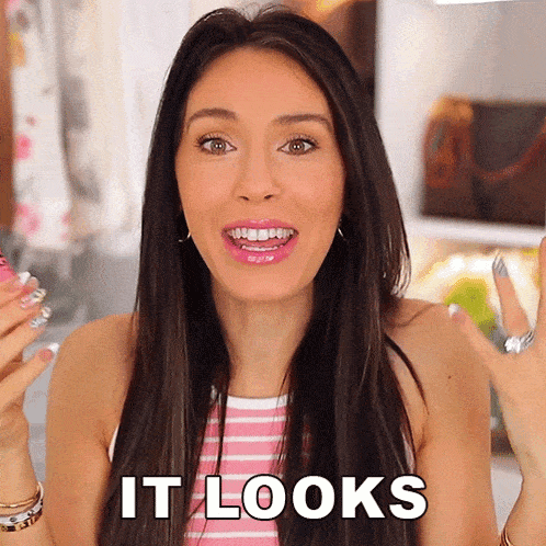 a woman in a pink and white striped top says " it looks "