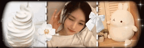 a woman wearing headphones is surrounded by white objects including a stuffed animal and a flower .