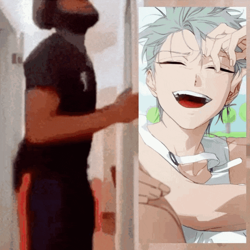a man in a black shirt is standing next to a picture of a smiling anime boy