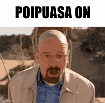 a man with glasses and a beard is standing in front of a sign that says " poipuasa on "