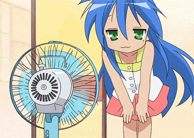 a girl with blue hair and green eyes is standing in front of a fan