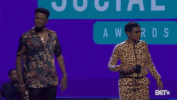 dc young fly and jess hilarious stand on stage
