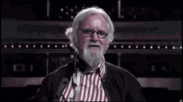 a man with glasses and a beard says " jesus suffering fuck "