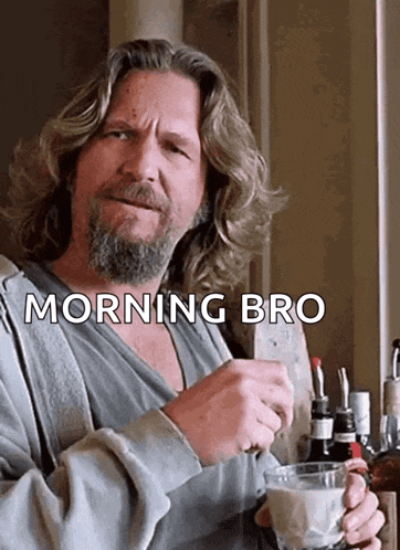 a man with long hair and a beard is holding a cup of coffee with the words morning bro written above him