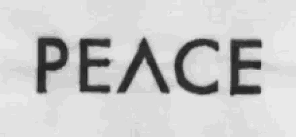 a black and white drawing of a peace sign with a heart in the middle