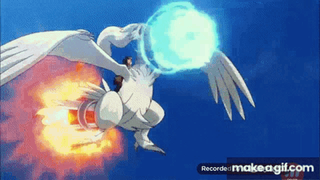a person is riding on the back of a flying pokemon .