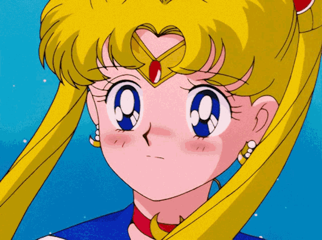 a close up of a girl with a heart on her head