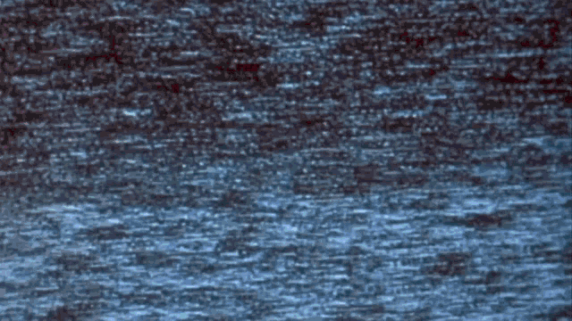a blue and white background with a few spots on it