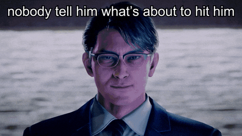 a man wearing glasses and a suit with the words nobody tell him what 's about to hit him