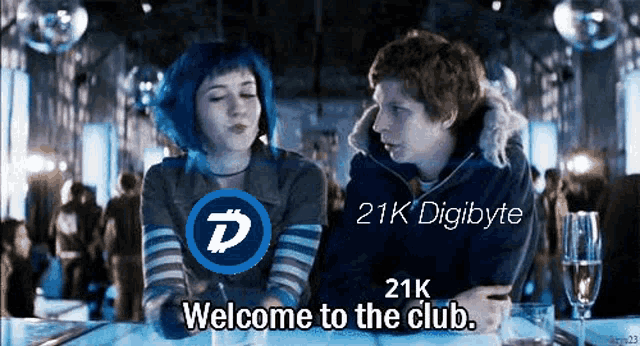 a man and a woman are sitting at a table with the words welcome to the club below them