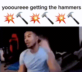 a man in a blue shirt is getting hammered by a hammer