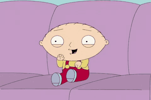 a cartoon character is sitting on a couch