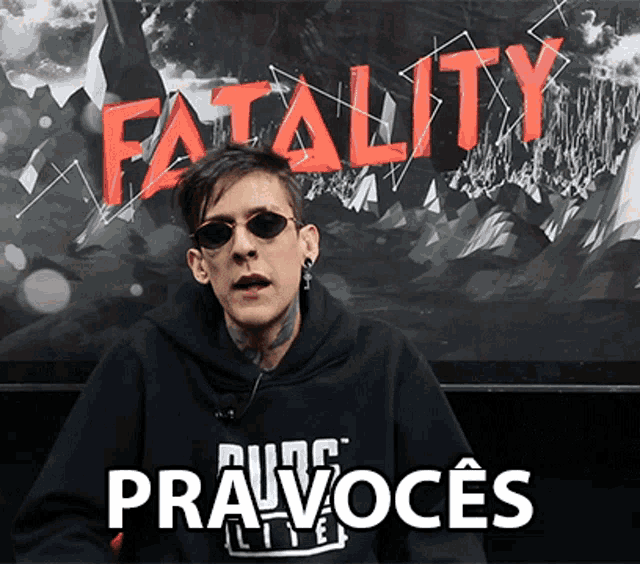 a man wearing sunglasses stands in front of a poster that says fatality pravoces