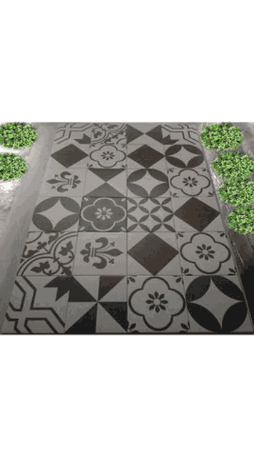 a black and white tile with a floral pattern