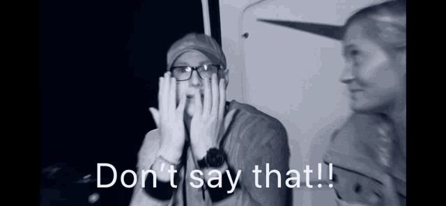 a black and white photo of a man and a woman with the words " do n't say that " written on the bottom