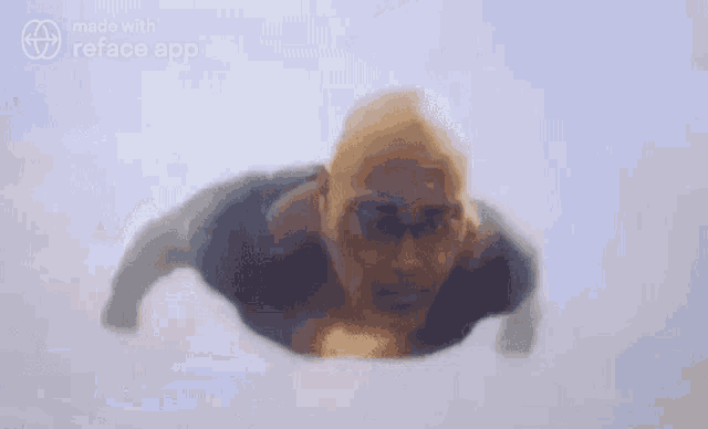 a bald man is flying through the air while wearing glasses .