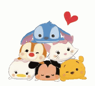 a group of disney characters stacked on top of each other with a heart above them .