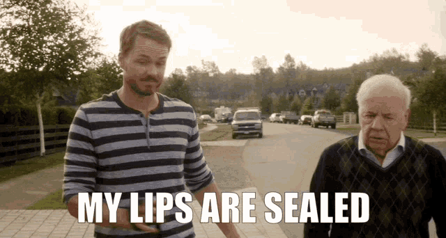 a man and an older man are standing on a sidewalk with the caption my lips are sealed