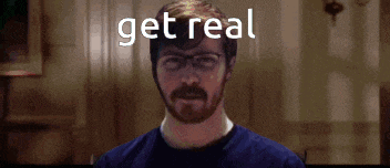 a man with glasses and a beard has the words get real written above him