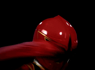 a red power ranger stands in front of a circle that says phoenix on it