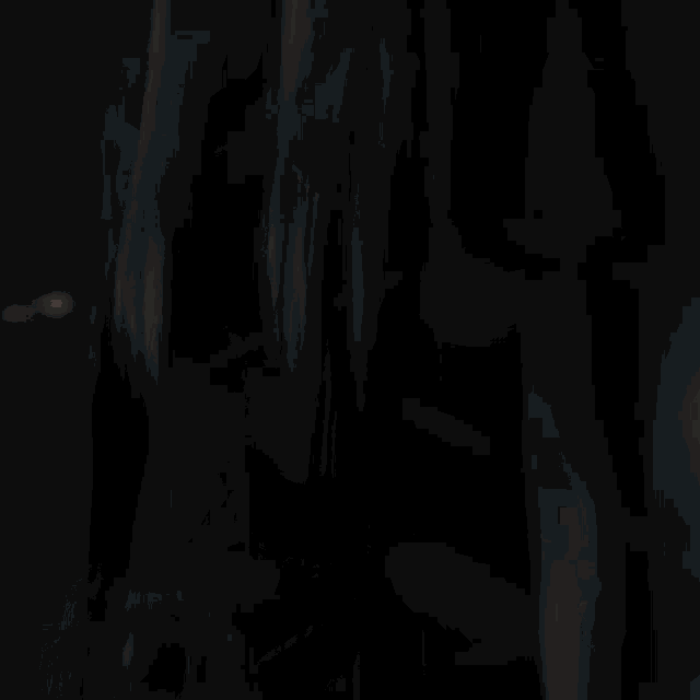 a woman with glowing blue eyes is screaming in the dark