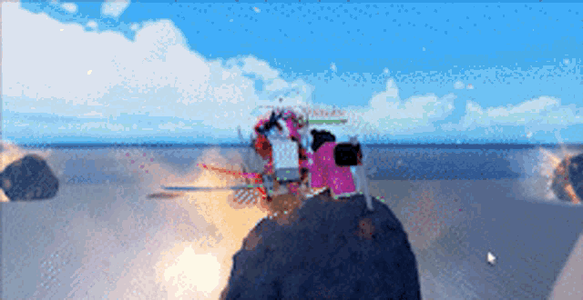 a screenshot of a video game shows a person standing on a rock near the ocean