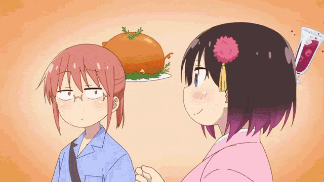 a girl with a flower in her hair is standing next to another girl with a plate of food on her head