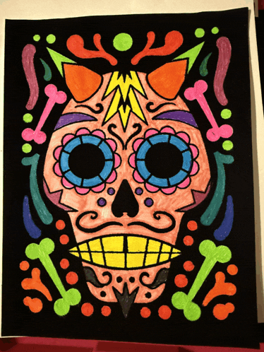 a day of the dead sugar skull with a cat 's face
