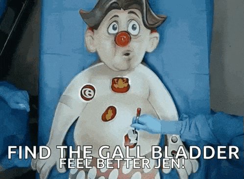 a cartoon character with a red nose is being examined by a doctor