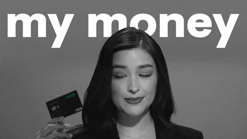 a woman is holding a visa card in front of the words my money