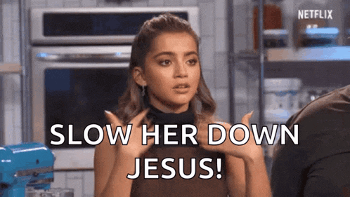 a woman in a kitchen says slow her down jesus .