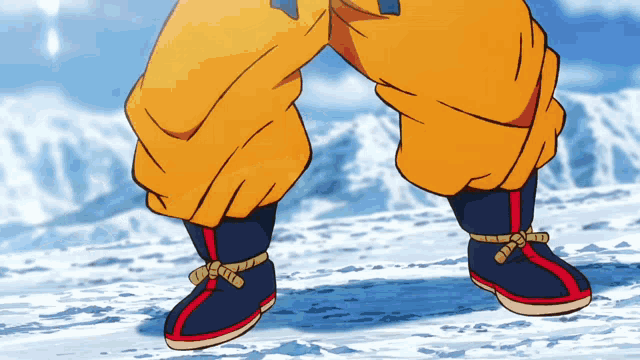 a close up of a cartoon character 's feet in the snow