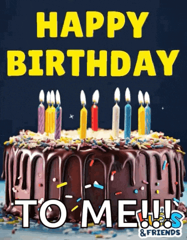 a chocolate birthday cake with candles and sprinkles and the words `` happy birthday to me ! ''