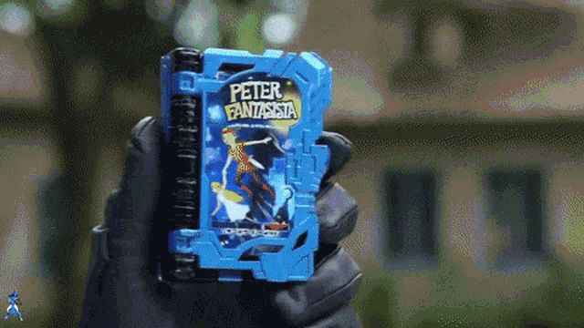 a person is holding a book that says peter fantasista on it