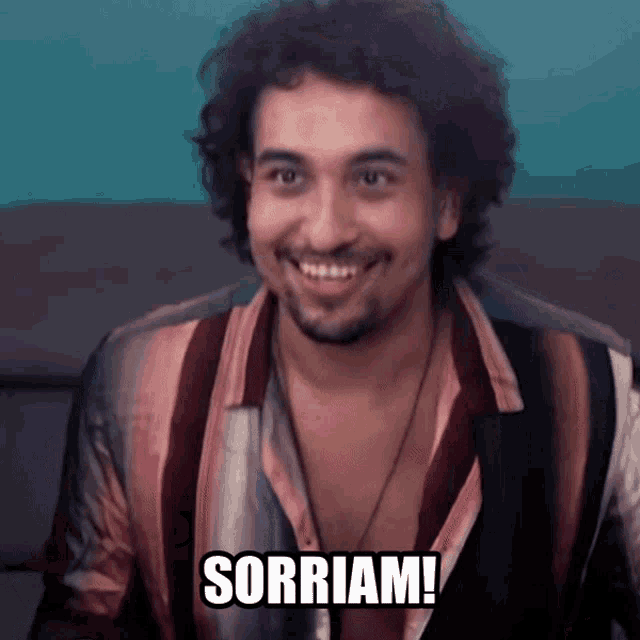 a man in a striped shirt is smiling with the words sorriam written below him