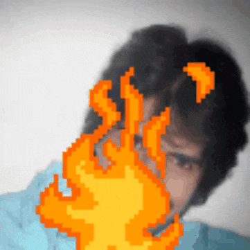 a pixelated image of a man with flames behind his face