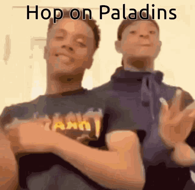 a couple of men are standing next to each other with the words hop on paladins on the bottom