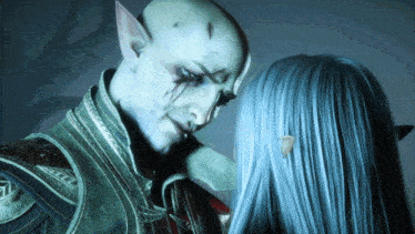 a man with a tear running down his face looks at a woman with long blue hair