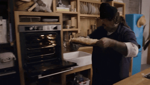 In The Oven It Goes Matty Matheson GIF - In The Oven It Goes Matty Matheson Cookin Somethin GIFs