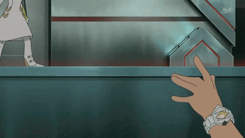 a person 's hand is reaching out towards a wall with the letters esc visible