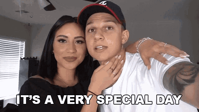 a man and a woman are posing for a picture with the words it 's a very special day above them