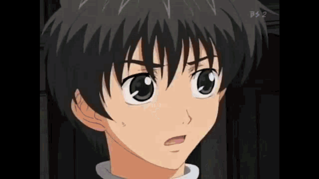 a close up of a boy 's face with a bs2 logo in the background