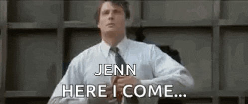 a man in a white shirt and tie is standing in front of a wall and says `` jenn here i come ... '' .
