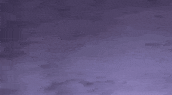 a purple background with a blue light coming out of it