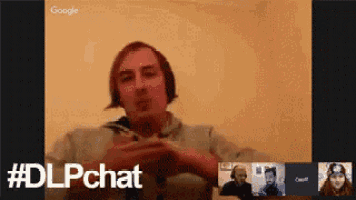 a man is talking on a video call with four other people and the hashtag #dlpchat